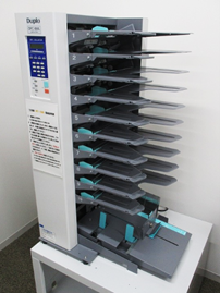 丁合機